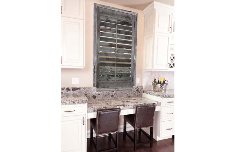 Reclaimed wood shutters on kitchen window in Boston